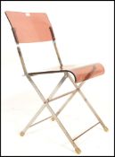 A retro mid 20th Century 1960's folding chair. The