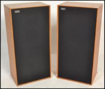 A pair of vintage / retro 20th Century teak cased Celestion Ditton 44 speakers, applied makers badge