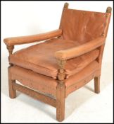 A good early 20th century leather upholstered easy