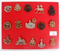 RARE COLLECTION OF WWII ECONOMY PLASTIC CAP BADGES