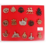 RARE COLLECTION OF WWII ECONOMY PLASTIC CAP BADGES