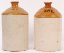 TWO RARE WWI STONEWARE RUM FLAGONS WITH SRD MARKIN