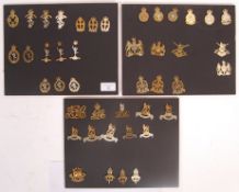 COLLECTION OF VINTAGE WWII & LATER UNIFORM CAP BADGES