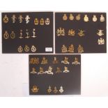 COLLECTION OF VINTAGE WWII & LATER UNIFORM CAP BADGES