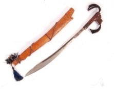 20TH CENTURY BORNEO PARANG ILANG / MANDAU CEREMONIAL KNIFE