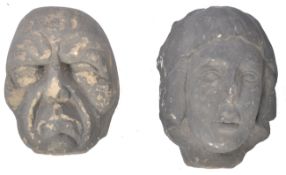 A PAIR OF EARLY CARVED STONE MEDIEVAL CARVED HEADS