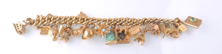 A HALLMARKED 9CT GOLD CHARM BRACELET