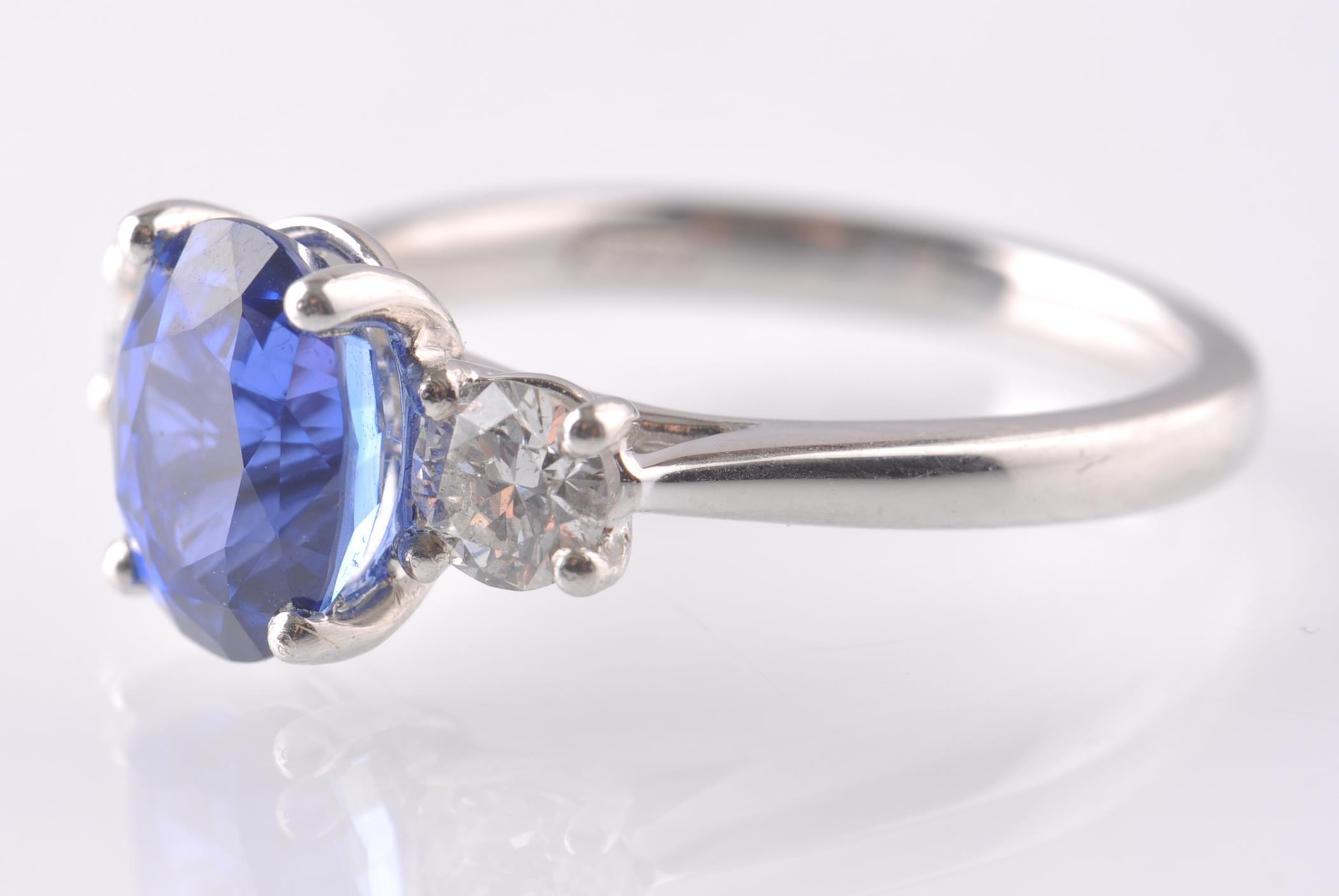 A PLATINUM SAPPHIRE & DIAMOND THREE STONE RING. - Image 2 of 5