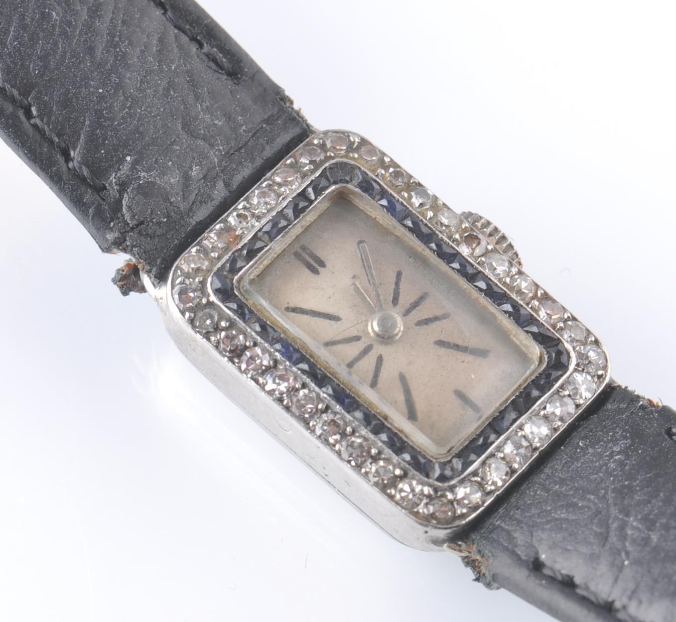 A FRENCH ART DECO PLATINUM SAPPHIRE AND DIAMOND WA