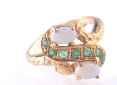 A GOLD OPAL & EMERALD SNAKE DRESS RING