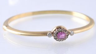 18CT GOLD RUBY AND DIAMOND BANGLE