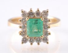 18CT GOLD EMERALD & DIAMOND RING