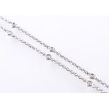 AN 18CT WHITE GOLD AND DIAMOND NECKLACE - 16 COLLE