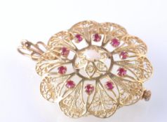 A 14CT GOLD RUBY AND OPAL PENDANT BROOCH
