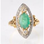 A HALLMARKED 18CT GOD EMERALD AND DIAMOND RING