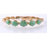 A GOLD & NATURAL JADE BRACELET WITH 5 JADE CABOCHO