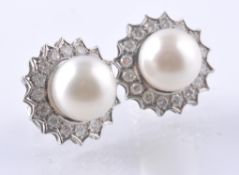 A PAIR OF 18CT WHITE GOLD DIAMOND AND PEARL EARRIN