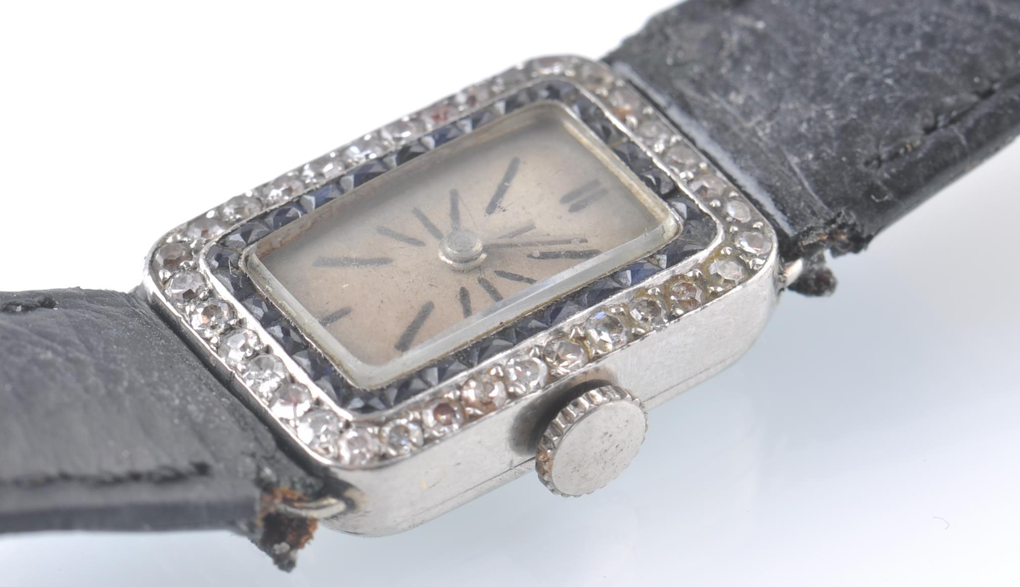 A FRENCH ART DECO PLATINUM SAPPHIRE AND DIAMOND WA - Image 4 of 5