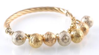 AN ITALIAN BAR AND BAUBLE BRACELET