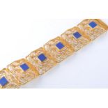 A MID CENTURY 14CT GOLD AND LAPIS LAZULI BRACELET