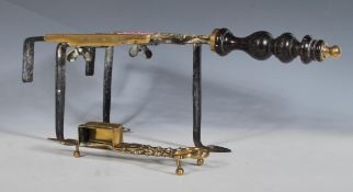 A 19th Century Georgian brass trivet stand having