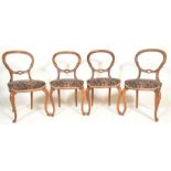 A set of four 19th Century Victorian walnut balloo