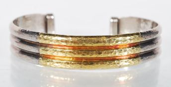 A stamped 950 open cuff silver bangle bracelet hav