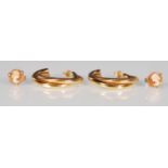 A pair of stamped 375 9ct gold ladies hoop earring