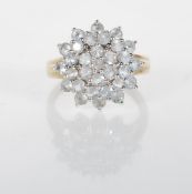 An English hallamarked 9ct gold cluster ring set w