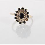 An English hallmarked 9ct yellow gold cluster ring