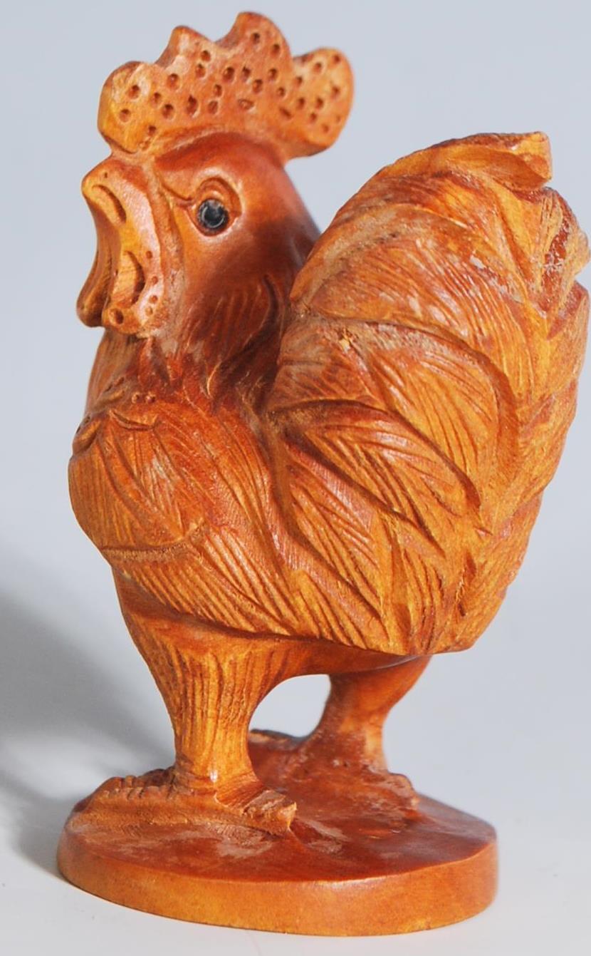 A finely carved boxwood netsuke in the from of a r - Image 2 of 6