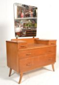 A retro mid 20th Century light oak dressing table