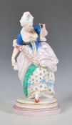 A French porcelain antique ceramic figurine in the