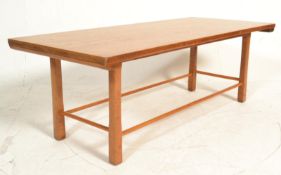 A mid century Danish inspired oak ' long john ' ty