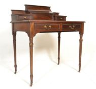 An 19th Century mahogany writing table / desk rais