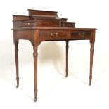 An 19th Century mahogany writing table / desk rais