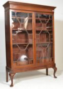 19TH CENTURY MAHOGANY GLAZED BOOKCASE ON STAND.