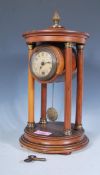 An early 20th Century mahogany pendulum portico ma