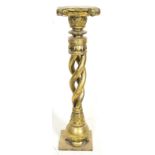 A contemporary composite pedestal / torchere / pla