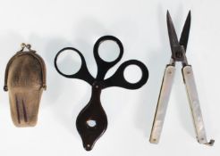 A pair of 20th Century folding pocket scissors hav