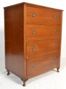 A vintage mid 20th Century mahogany chest of drawe