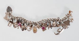 A mid 20th Century silver hallmarked charm bracele