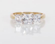 An English hallmarked 9ct yellow gold ring set wit