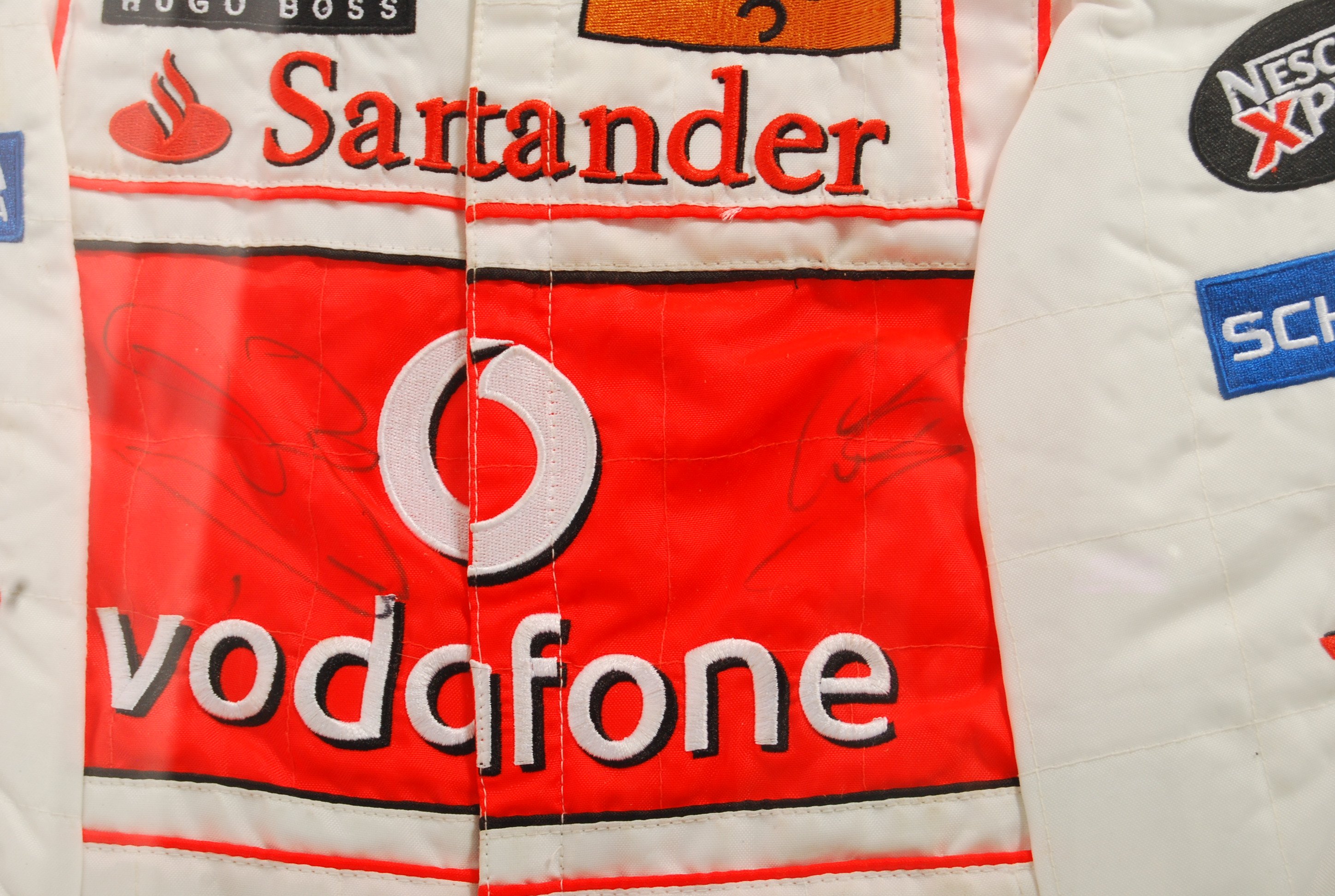 LEWIS HAMILTON & JENSEN BUTTON AUTOGRAPHED MCLAREN RACE SUIT - Image 4 of 6