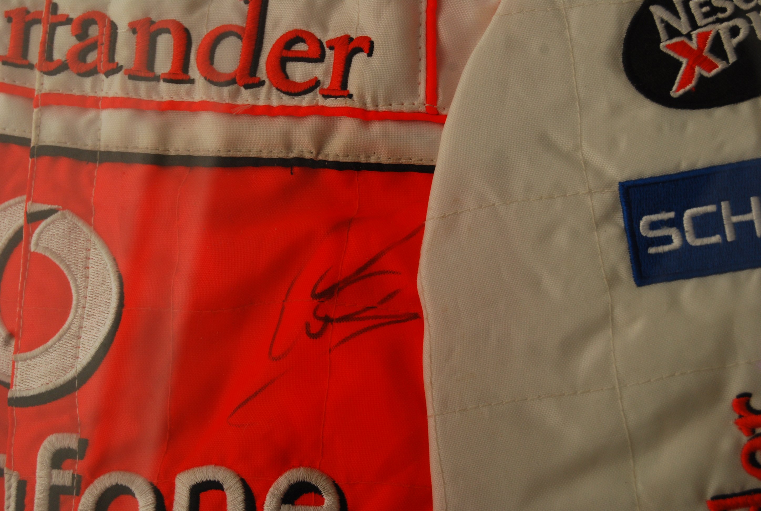 LEWIS HAMILTON & JENSEN BUTTON AUTOGRAPHED MCLAREN RACE SUIT - Image 6 of 6