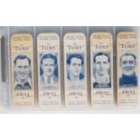 A full set of vintage Turf uncut cigarette packets / cards '50 Footballers' printed in blue on