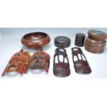 A collection of African Treenware dating from the 1940's to include hardwood lidded pots of