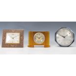 A group of three clocks from the 20th Century to include one by Blessing having a decorative