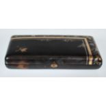 A 19th Century Victorian tortoiseshell cigarette case having silver and gilt brass inlaid decoration