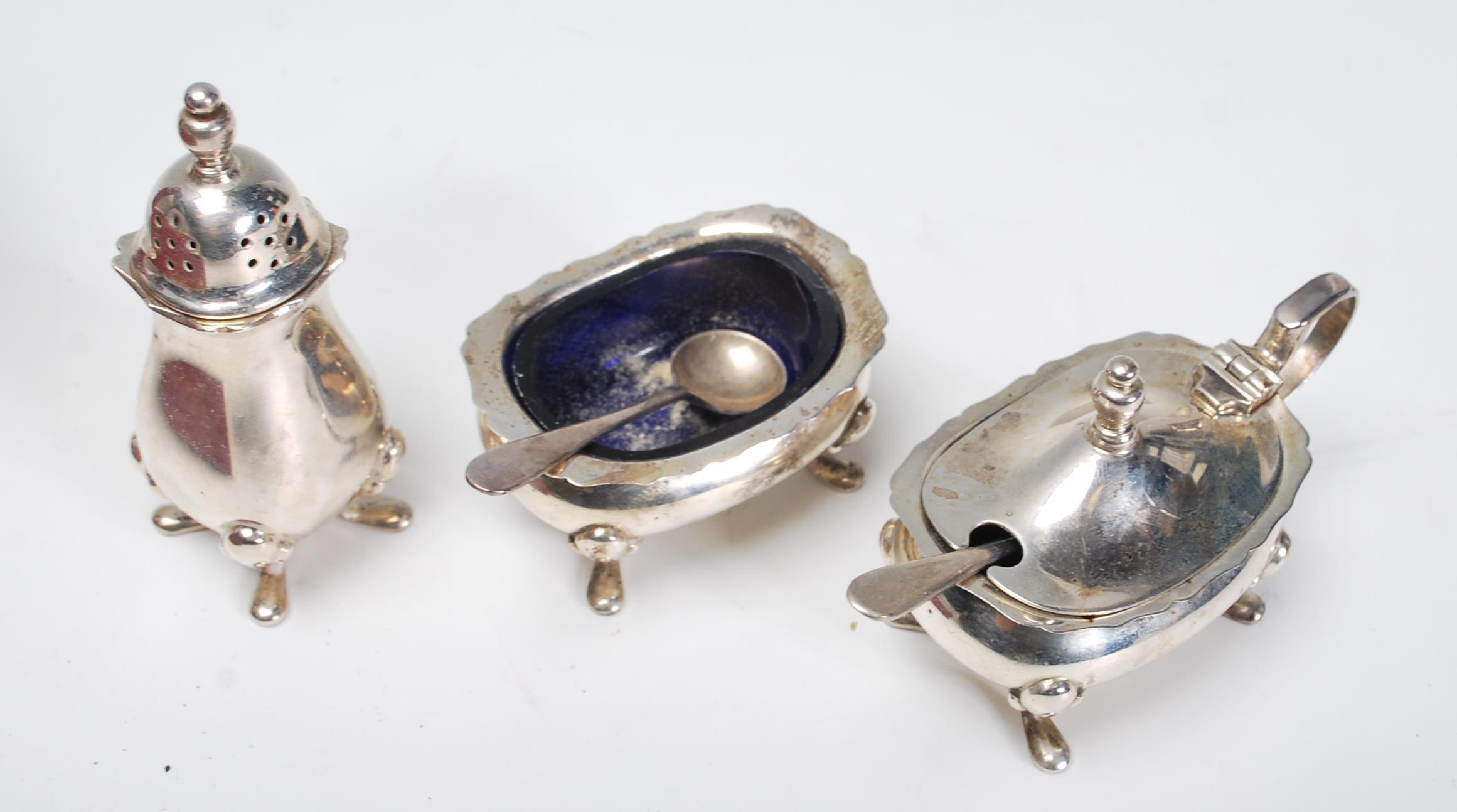 A 20th Century Barker Brothers silver cruet set consisting mustard pot, pepperette, and table sale - Image 3 of 4